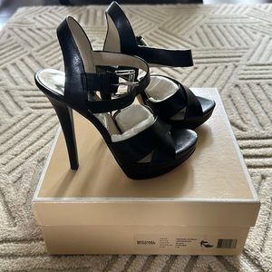 Michael Kors Oksana Sandal. New in box. Size 7M. Black.